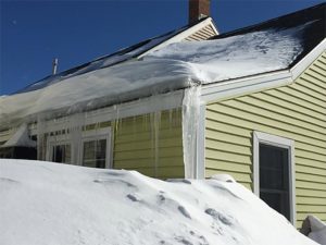 AAA Public Adjusters - Home with snow and ice damage